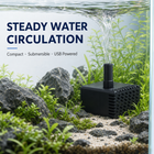 OUKMAO USB aquarium pump circulating water in a planted fish tank